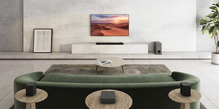 There is TV showing a nature image. A sound bar, a subwoofer, and 2 rear speakers in a wide living room. A wave with grid is coming out from sound bar, measuring the entire space of living room.