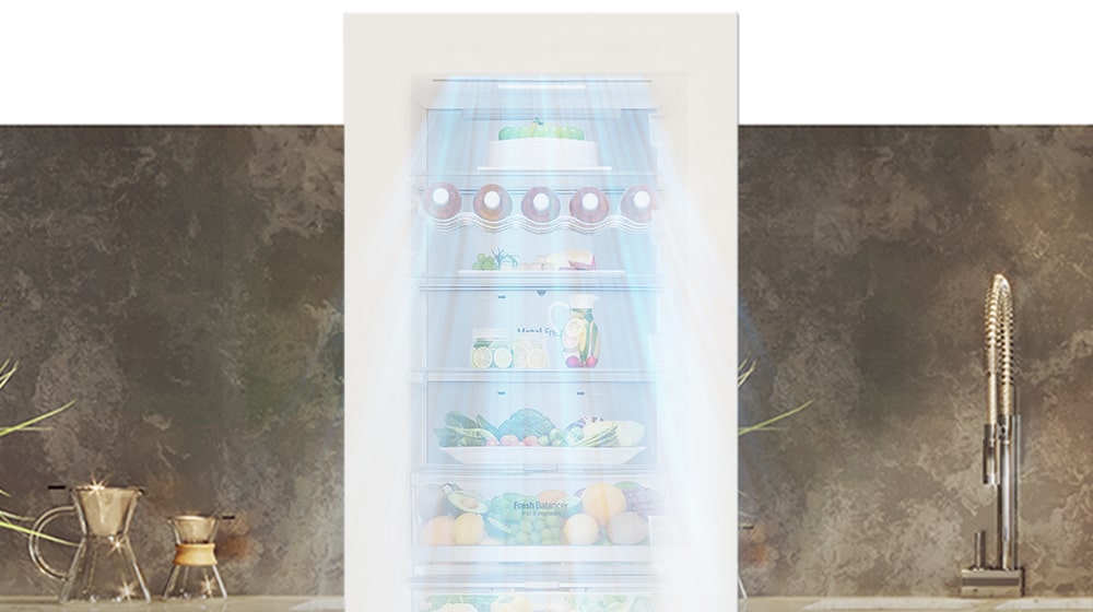 The top half of the refrigerator is shown with the door open. Inside, the shelves are filled with produce and drinks and a gust of wind comes down from the top to cool off the food.