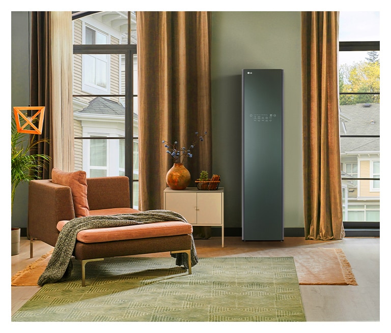 It shows nature green color LG Objet Collection Styler placed in the dressing room that matches naturally to the furniture around.