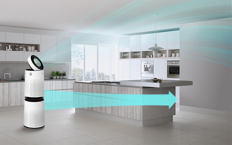 LG air purifier in a bright, modern kitchen circulates clean air, shown with blue arrows, enhancing the spacious environment.