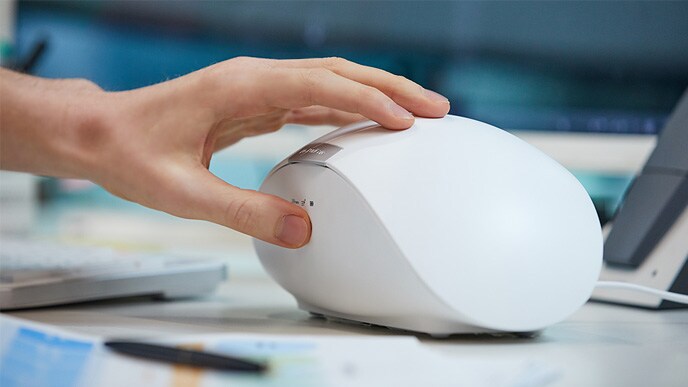 You can see the PuriCare wearable case to be touched with a hand.