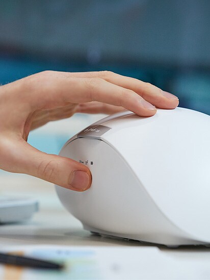 You can see the PuriCare wearable case to be touched with a hand.