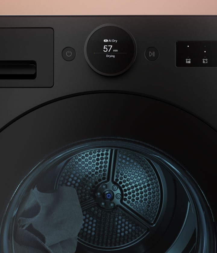 Animation showing clothes tumbling in a dryer while air circulates through the heat pump system inside the unit.