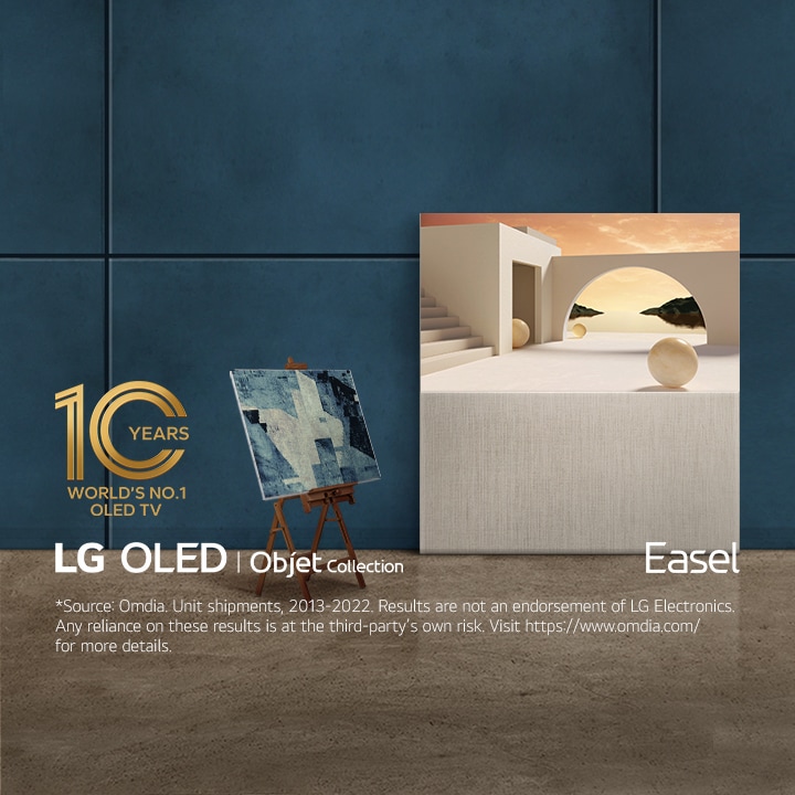 EASEL in Full View with a beige architectural structure on-screen as it leans against a deep blue wall. To its right is a blue painting on an easel at a 45-degree angle. The "10 Years World's No.1 OLED TV" emblem is also in the image. 