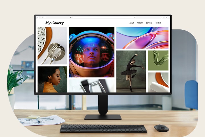 A 27-inch Full HD IPS monitor is displayed on a modern desk setup, showing a colorful photo gallery. The scene highlights the monitor's slim design, vivid color accuracy with sRGB 99% (Typ.), and sharp Full HD resolution. A keyboard, mouse, coffee cup, and headphones complete the clean workspace.