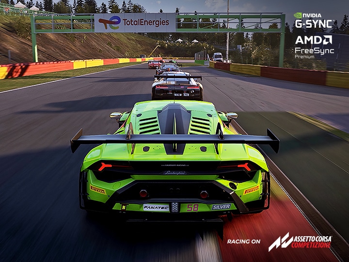 A racing game scene showing a bright green sports car leading on a track, with multiple cars following behind under the AMD FreeSync Premium feature.	