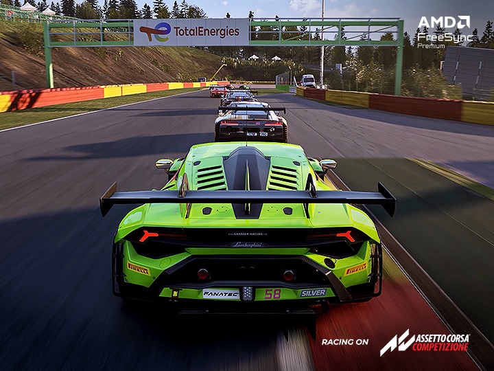 A racing game scene showing a bright green sports car leading on a track, with multiple cars following behind under the AMD FreeSync Premium feature.