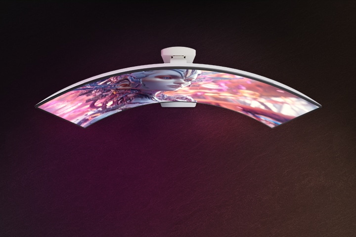 An animated video transitioning from a front view to a top view of a curved monitor.