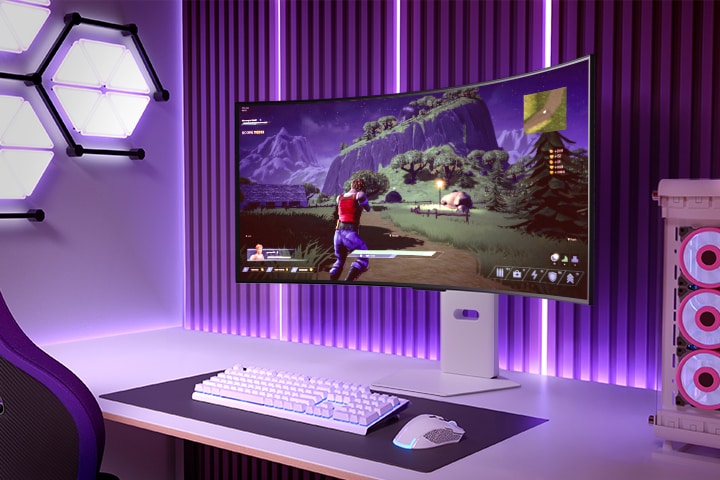 Curved gaming monitor displaying an action-adventure game in a vibrant gaming setup with purple lighting and a PC tower nearby.