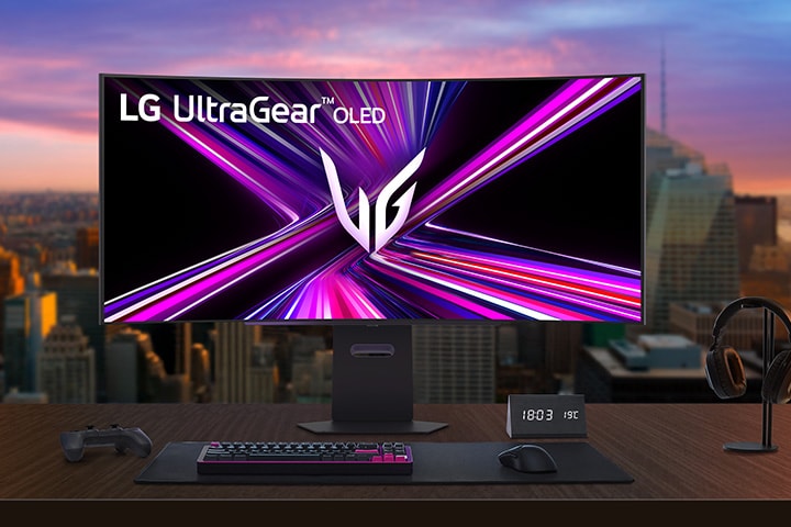LG UltraGear OLED monitor setup on a gaming desk in a modern room.	