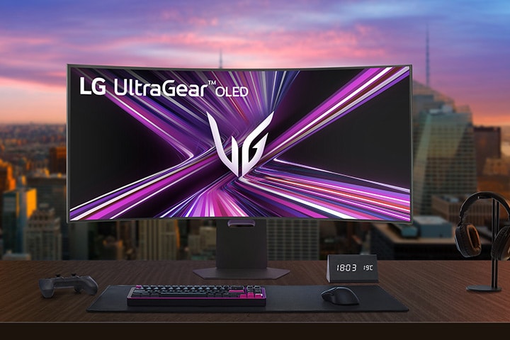 LG UltraGear OLED monitor setup on a gaming desk in a modern room.
