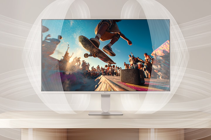 LG Smart Monitor demonstrating AI Sound Pro with a cinematic concert scene on screen, highlighting immersive audio optimization, clear dialogue, and balanced sound performance for an enhanced home entertainment experience