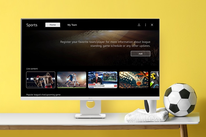 The LG Smart Monitor screen is showing live sports channels.	
