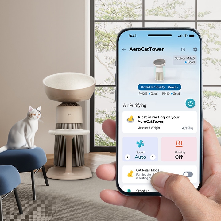 Image of a cat sitting on a sofa in the living room, staring forward, with the LG ThinQ app AeroCatTow main screen displayed	