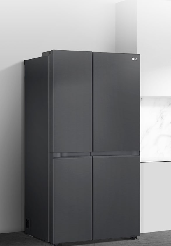 A side view of a kitchen with a black InstaView refrigerator installed.
