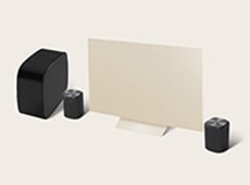 A pair of M5 speakers with a W7 woofer LG AI Stereo Suite 5 Pro