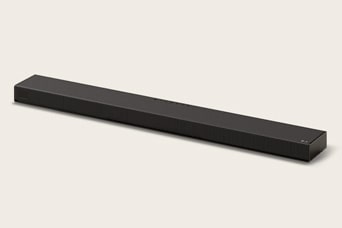 A black Sound Suite H7 Soundbar from above, turned at a slight angle