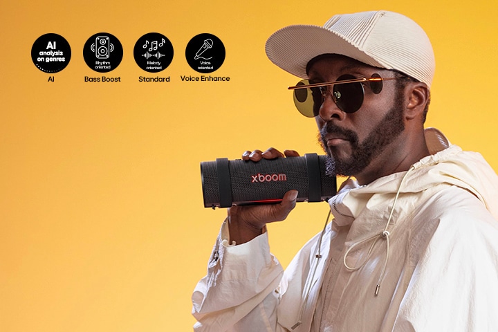 will.i.am is holding xboom Grab on his right hand.