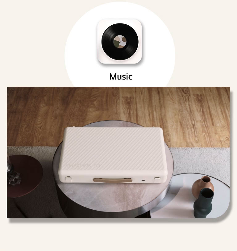 Animated clip of the LG StanbyME Go, placed in the living room. In the beginning the screen is closed. As the camera moves forward the screen opens, and the camera zooms in to the home screen. The screen swipe to left, a coach mark appers on the Music icon. And it shows a green turntable music skin, and the camera zooms out.