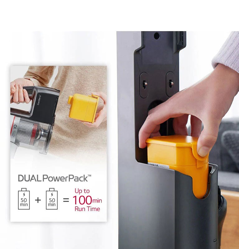 One person inserts a yellow battery into a charging dock, while another person holds the same battery near a vacuum cleaner.