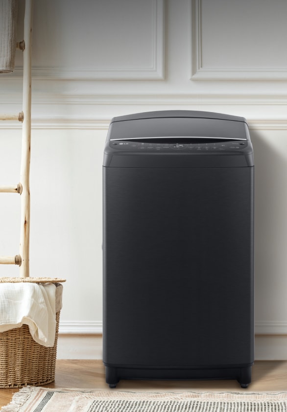 LG top load washing machine in the laundry room	