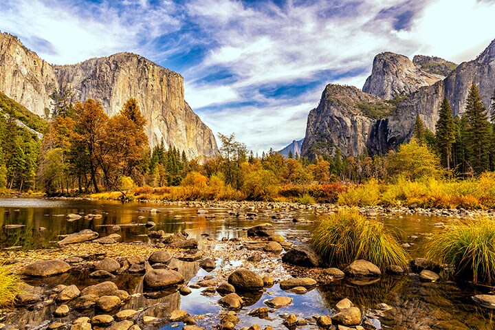 Yosemite Valley in the fall, with golden hues illuminating the landscape—a perfect scene to enjoy with a camping gadget that lights up the night.