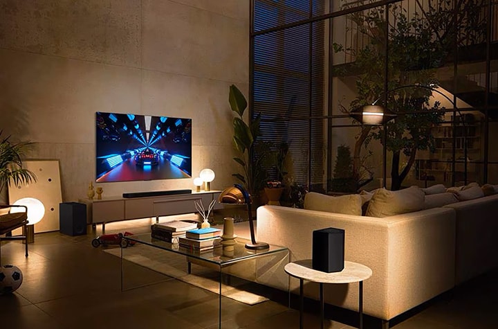 A man cave with an immersive gaming setup, including a high-quality gaming monitor, creating an intense visual experience in a personal, cozy space.