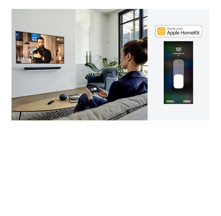 A woman on the couch watching Apple TV+ content using the Apple Homekit on her cell phone (move the slide)