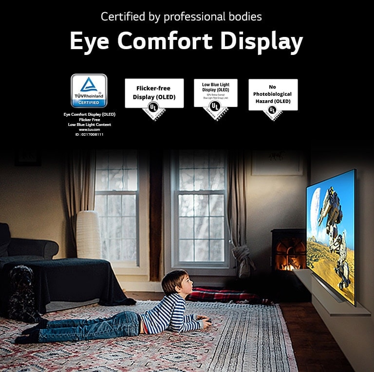 A side view of a boy laying down and watching a TV, labeled "Eye Comfort Display"