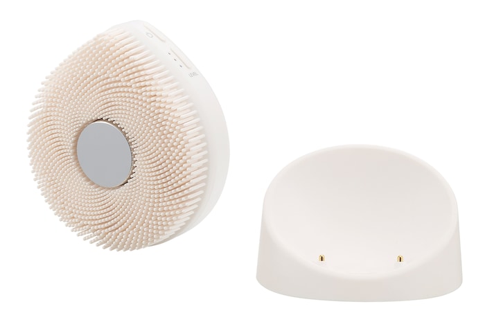 Angled view of LG Pra.L WashPop BCP2A and cradle