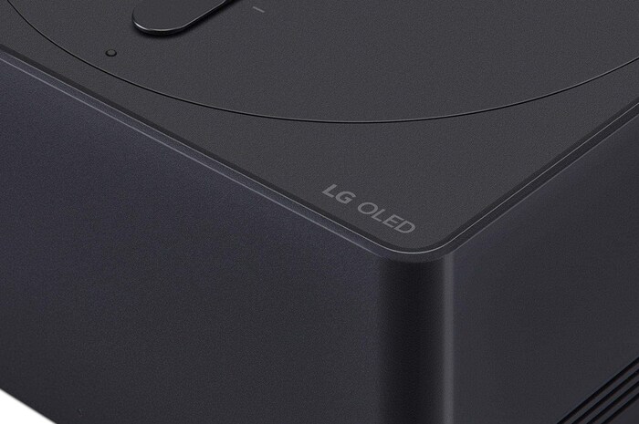 Close-up image of a Zero Connect Box showing the logo of LG OLED on the edge