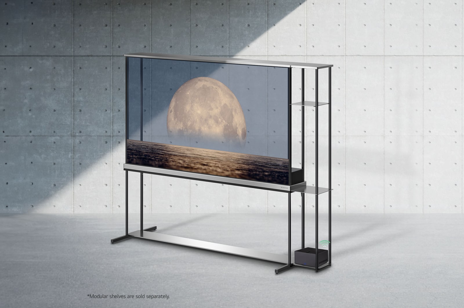 Slightly-angled left-facing side view of LG SIGNATURE OLED T screen depicting a moon above shore on a transparent screen. Zero Connect Box with 4K 120Hz wireless video & audio transfer connected to the TV sitting on an attached modular shelving unit, and a WiFi signal coming out of the box.