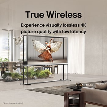 LG Signature OLED T sits in the middle of a modern living room depicting a dancer. Zero Connect Box is placed on a small table next to the couch.