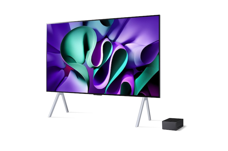 Slightly-angled left-facing side view of LG OLED M4 on the stand  with the Zero Connect Box below it