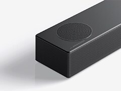 A part of the left side of the sound bar product is shown.