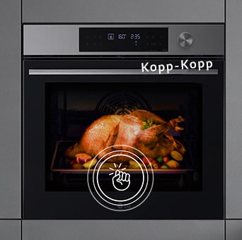 InstaView™ technológiát jelző kopogtató ikon látható a sütő ajtaján, miközben a sütő belseje világít.