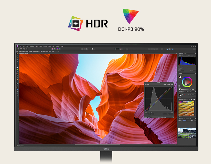 Egy fehér LG monitor elülső nézete, amely élénk kanyon-képeket jelenít meg színkorrekciós eszközökkel, kiemelve a HDR-t és a 90%-os DCI-P3 színlefedettséget.