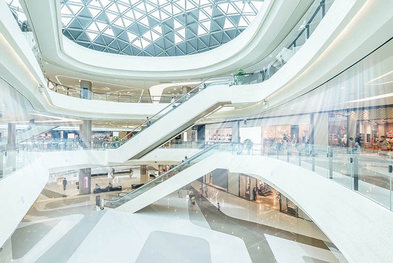 An image of an atrium at a shopping mall with air conditioning on.
