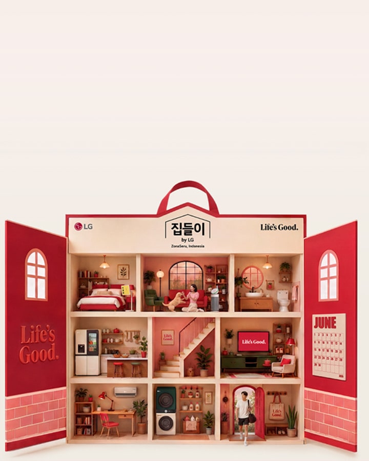 A cross-section illustration of a dollhouse-style house in warm tones, designed in the form of a gift bag with a red handle. Each room showcases LG home appliances and everyday life, including: a bedroom, a living room with a woman and a dog, a bathroom, a kitchen with a refrigerator, a staircase landing, a TV room, a home office, a laundry room, and an entryway with a man heading outside. "Housewarming by LG" in Jakarta, Indonesia.