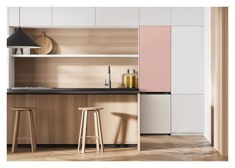 It shows mist beige color Bottom Freezer placed in the kitchen that matches naturally to the furniture around.