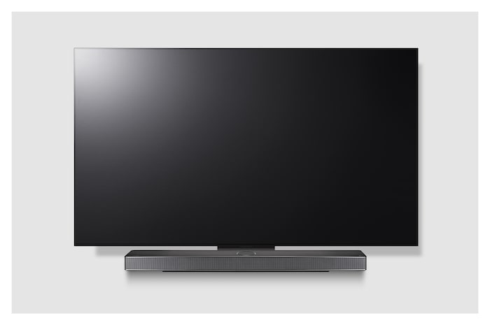 Front view of LG TV and Sound Bar mounted with an exclusive bracket