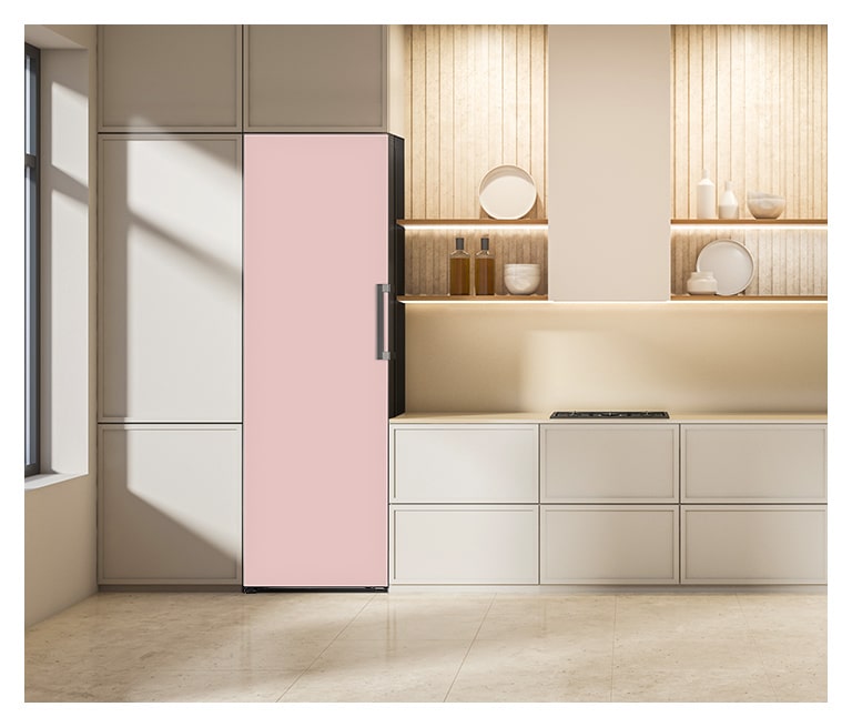 It shows mist beige color LG Freezer Objet Collection is placed in the kitchen that matches naturally to the furniture around.