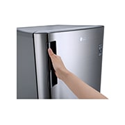 The hand holding the handle