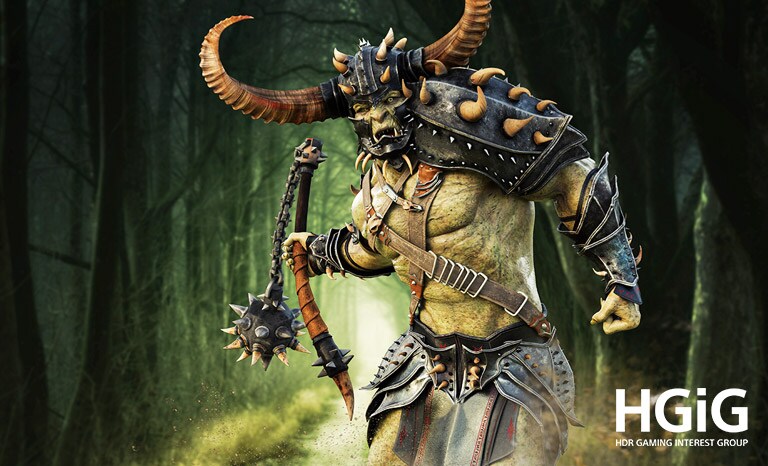 Adegan dari game monster ditampilkan pada separuh layar TV konvensional dan separuhnya lagi di LG NanoCell TV dengan HDR.