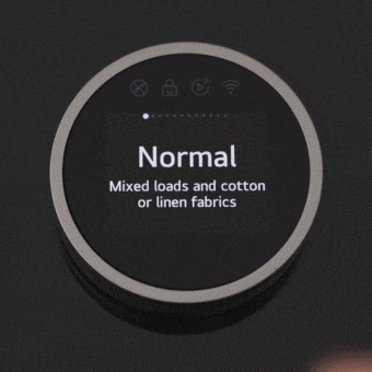 Layar menampilkan perubahan menu dengan dial mesin cuci