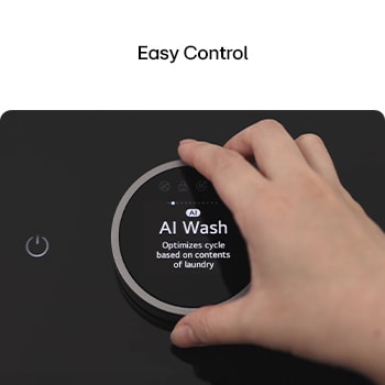 Hand adjusting AI Wash cycle on LG washing machine's control knob.