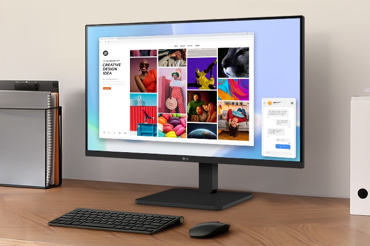 Ruang kerja di atas meja dengan monitor dan tempat dokumen.