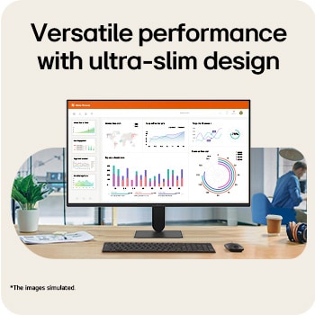 Monitor LG FHD di atas meja menampilkan grafik dasbor kantor dengan keyboard dan mouse dalam pengaturan area kerja.