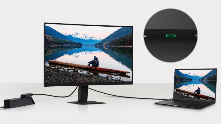 Imagen de una computadora portátil y un monitor conectados con un solo cable USB-C.