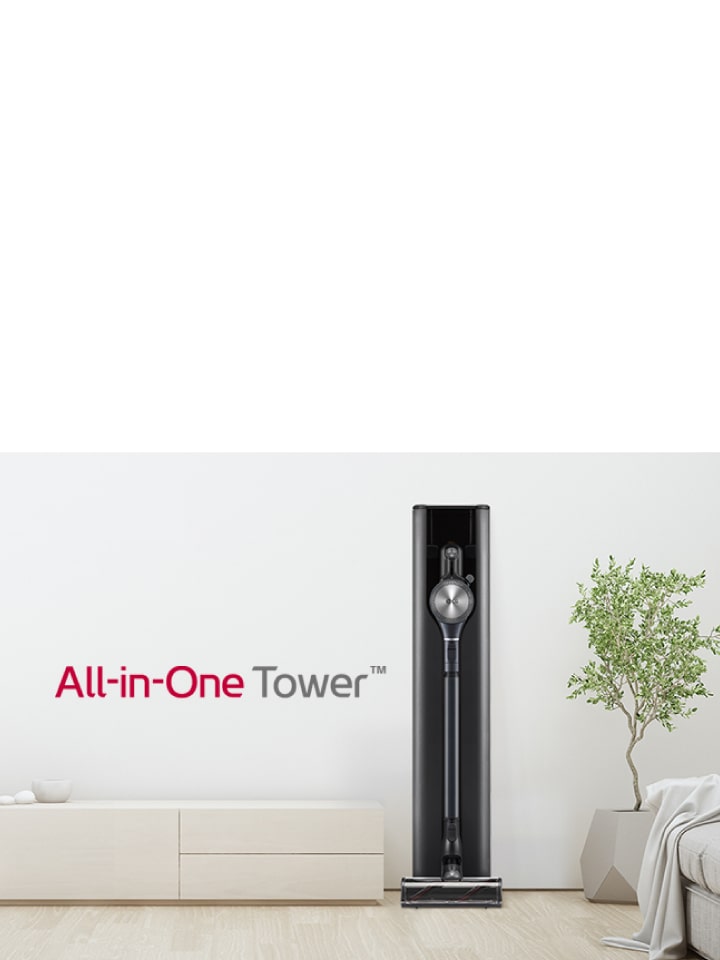 Ini menunjukkan gambar bagian depan A9 All-in-One Tower dalam interior ruang tamu modern bernuansa putih.